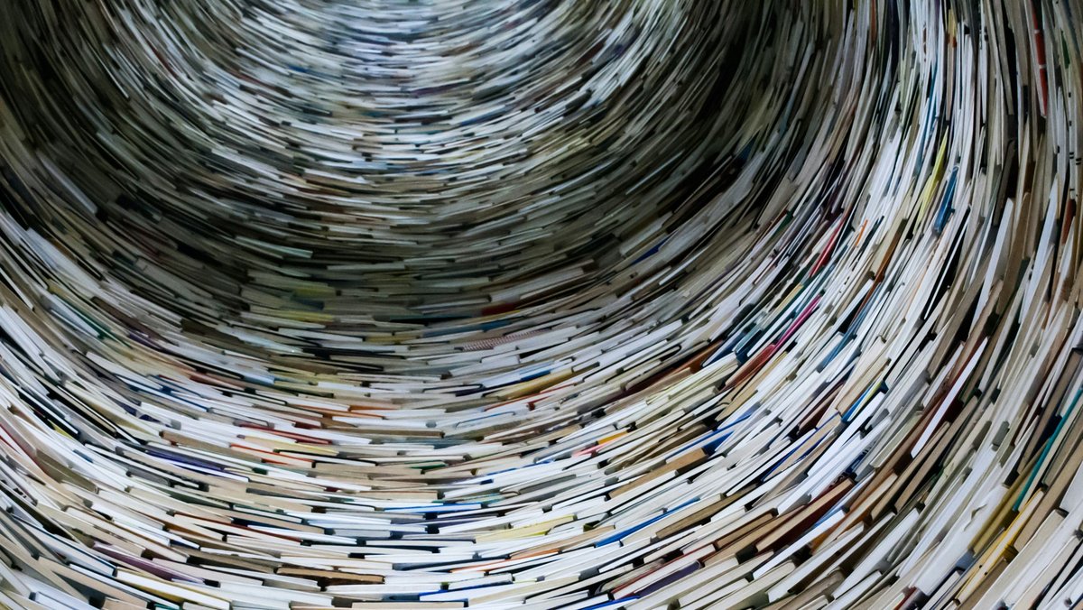 inside of a round tower composed of books